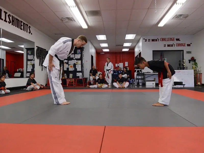 Kids in San Dimas martial arts class improving focus, discipline, and listening skills through martial arts training